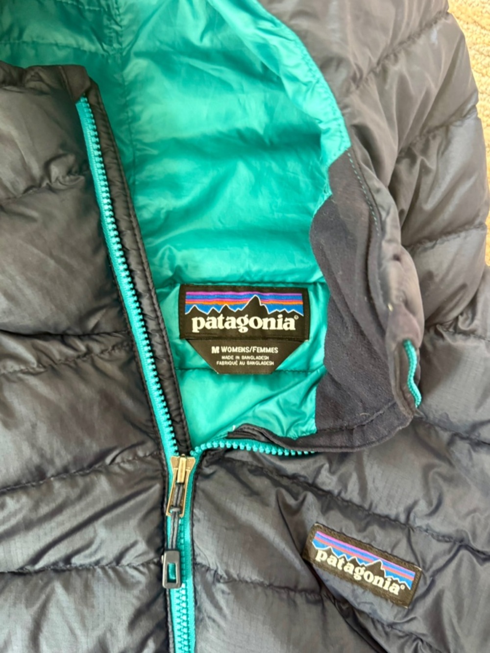 Patagonia Navy Jacket with Teal Lining and Teal Zipper - Picture 2 of 3